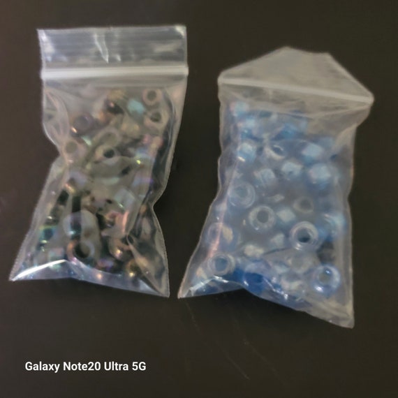 2 Small Bags of Blue & Peacock Pony Beads