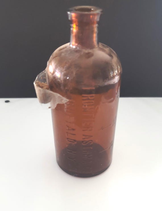 Amber Frontier Asthma Co Bottle circa 1900