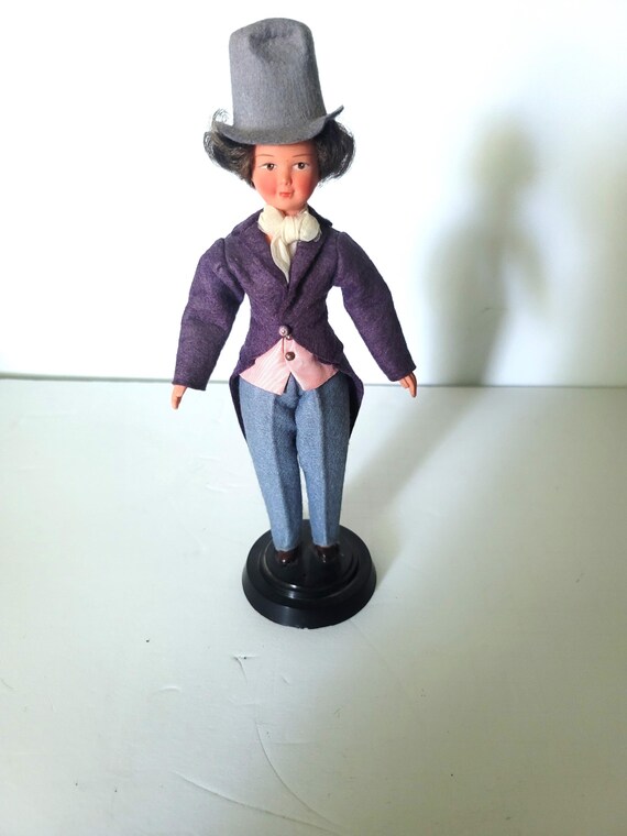 Vintage Doll in Felt on Base