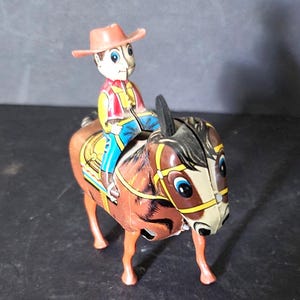 ゼンマイ式 カウボーイ 昔のおもちゃ Cowboy wind up toy - Etsy 日本