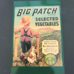 May include: Vintage advertisement for "Big Patch" brand vegetables. The image features a young person in overalls and a straw hat, looking over a fence at a field, with a dog. The text reads "Selected Vegetables" and "Produce of U.S.A."