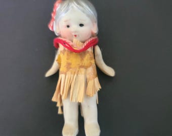 Tiny Bisque Doll in a Hawaiian Outfit