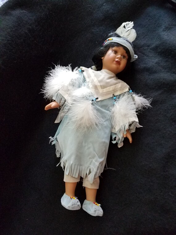 Native American Porcelain and Cloth Doll