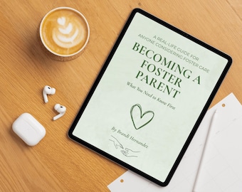 May include: A tablet displays the text "Becoming a Foster Parent" with a heart graphic. A cup of coffee with latte art, wireless earbuds, and a charging case are on a wooden surface.