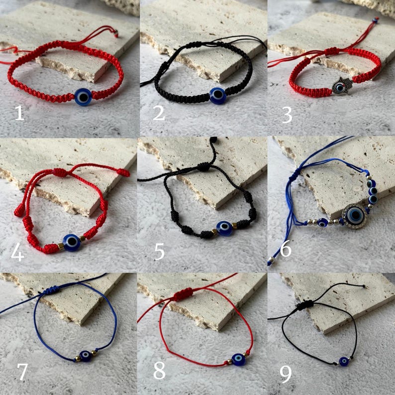 May include: A collection of nine adjustable bracelets, each featuring a blue evil eye charm. The bracelets come in various colors, including red, black, and blue, with different cord designs and embellishments. Some include additional charms.