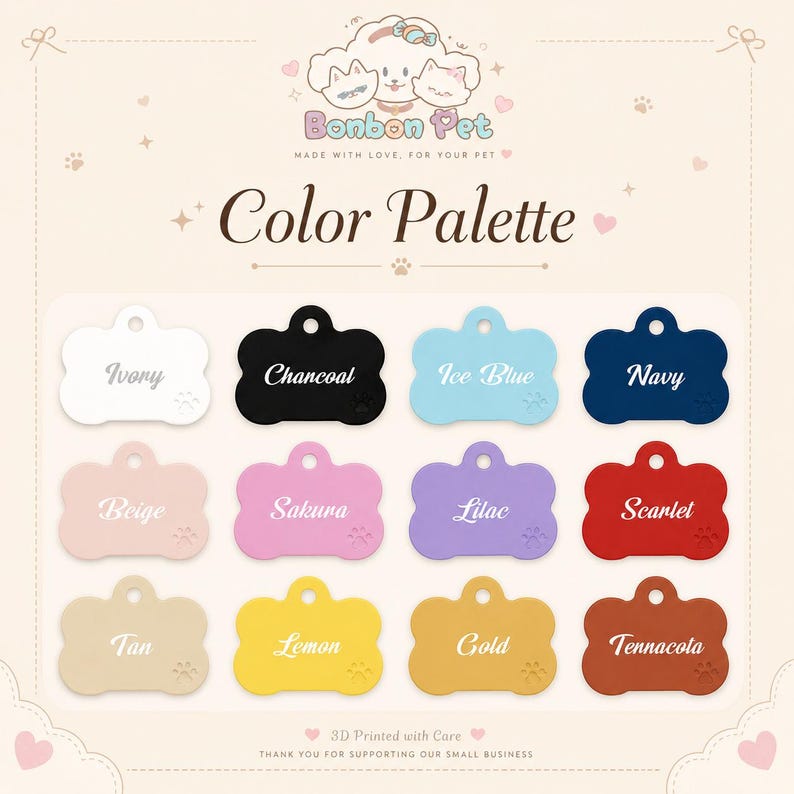 May include: A color palette chart for pet tags featuring twelve bone-shaped icons in ivory, charcoal, ice blue, navy, beige, sakura, lilac, scarlet, tan, lemon, gold, and terracotta. Each tag displays its color name and a small paw print.
