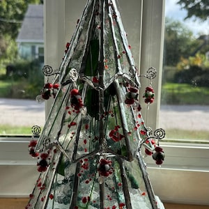 Lighted Three tier Christmas Tree.