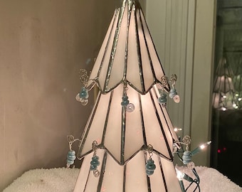 Iridescent white stained glass 3 tier lighted Christmas tree.