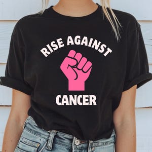 Rise Against Cancer Awareness Shirt Cancer Awareness Support Graphic Tee Pink Ribbon Fight Cancer TShirt Charity Cause Cancer Survivor Tee