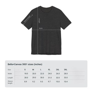 Op de afbeelding: Een maattabel voor Bella+Canvas 3001 T-shirts, met de afmetingen in inches voor maten S tot en met 3XL. De tabel bevat breedte, lengte en mouwlengte.