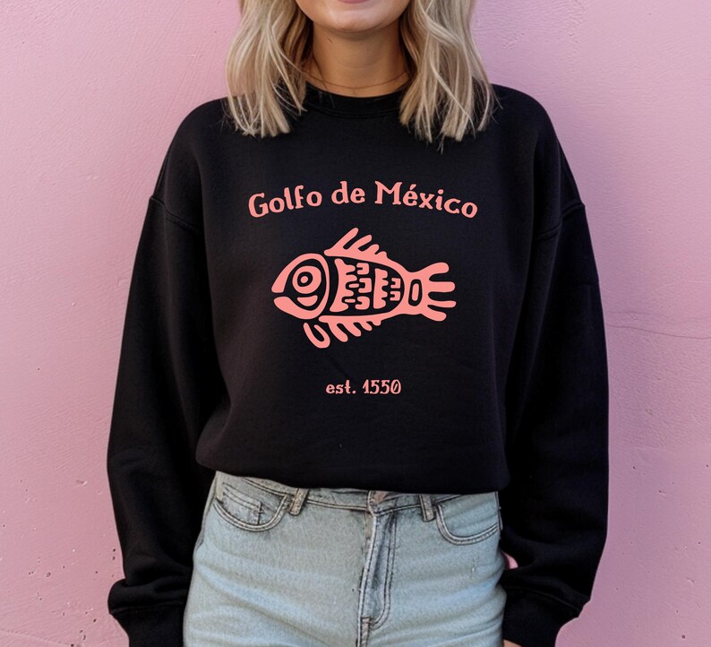 May include: Black sweatshirt with a pink fish graphic and the text "Golfo de M&eacute;xico est. 1550".