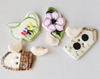 Eight Spring "Birds in the Garden" BUTTONS ~ Ceramic and Plastic ~ bird house, watering can, basket, flowers, tiny vintage birds