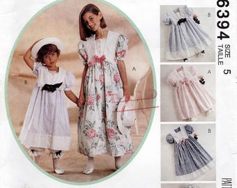 Vestido, pantalones y banda para sombrero de niña talla 5 de McCALLS, modelo 6394, completo y sin cortar.
