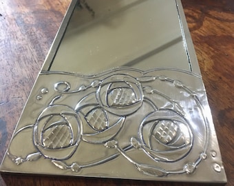 Wall mirror. Macintosh rose design. Small hanging pewter edged mirror.