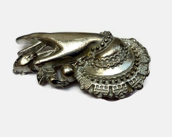 Victorian hand brooch
