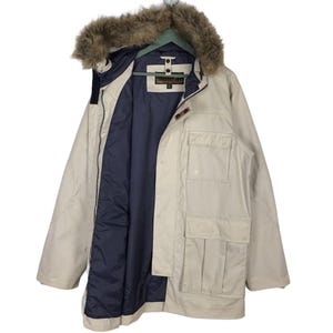 Chaqueta parka con cuello de piel sintética Timberland Weather Gear de los años 90.