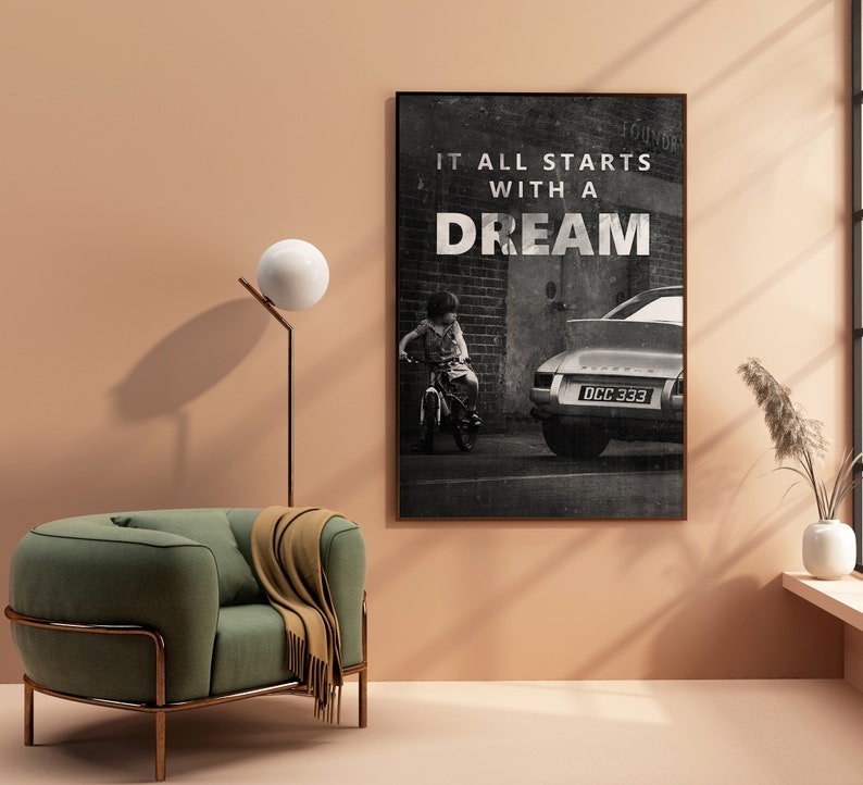 May include: Black and white photo print of a child riding a bicycle in front of a classic car with the text "It all starts with a dream" printed on the wall behind them.