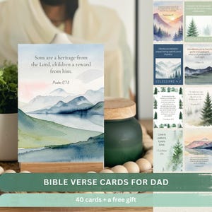 May include: A set of rectangular cards featuring watercolor landscape illustrations and printed Bible verses. The primary card displays a mountain range with the text: Sons are a heritage from the Lord, children a reward from him. Psalm 127:3.