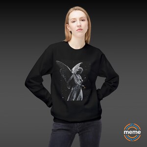 Guardian Angel Sweatshirt Soft Style Crewneck Pullover Color Black Worn on Woman Memeorable Apparel Los Angeles