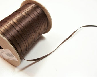 Brown Ribbon Schiff Single-Faced Sable Satin Ribbon 7/8 Inch Wide x 10 yards Brown Ribbon Schiff Single-Faced Sable Satin Ribbon 7/8 Inch Wide x 10 yards