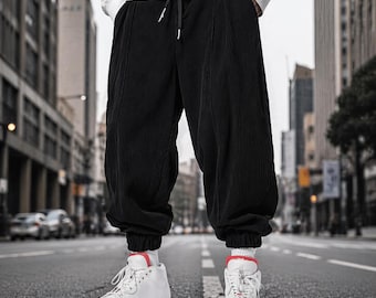 Pantalones deportivos de pana para hombre, corte holgado con cordón ajustable, estilo hip hop streetwear con puños.