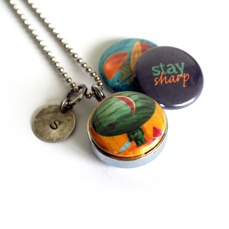Watermelon Zombie Locket Silver Steel, Magnetic Necklace, Orange, Stay Sharp by Polarity Cuddly Rigor Mortis Collection image 1