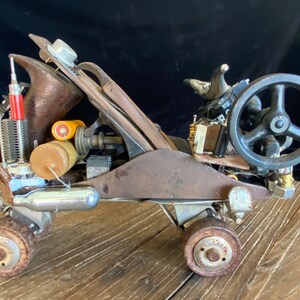 Assembage Found Object Steampunk Upcycled  Quad-Runner made from antique finds