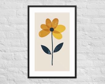 Puede incluir: Una lámina de arte enmarcada que muestra una flor amarilla estilizada con seis pétalos redondeados y un centro azul oscuro. La flor tiene un tallo fino azul oscuro y dos hojas azul oscuro sobre un fondo beige claro en un marco negro.
