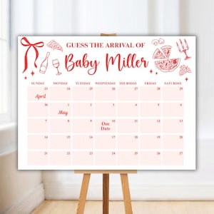 Może przedstawiać: Biały kalendarz na baby shower z czerwonymi akcentami, z napisem "Guess the Arrival of Baby Miller". Siatka kalendarza zawiera daty kwietnia i maja, ze zaznaczoną "Due Date". Elementy dekoracyjne: pizza, wino i kokarda.