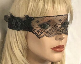 Beautiful beaded black lace mask filled with drama and mystique! Add sophistication to Halloween, New Year's Eve, Holidays and more!