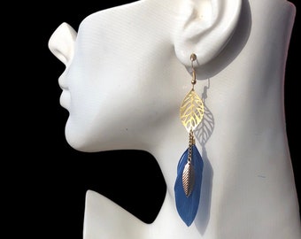 Simple, elegant blue feather earring with delicate leaf charm