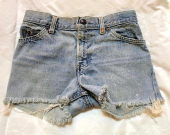 Vintage orange label Levi’s cut off’s Early 80s size 28 naturally distressed