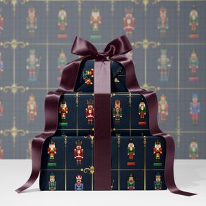 May include: A stack of wrapped gifts with a dark blue background featuring a repeating pattern of toy soldiers in various colors. The gifts are tied with a wide, dark burgundy ribbon and bow, creating a festive holiday presentation.