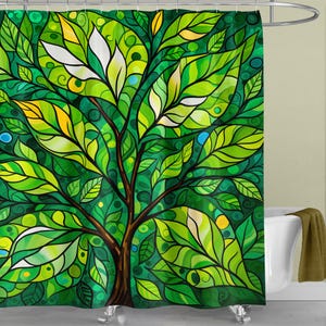 May include: A green, yellow, and blue stained glass style shower curtain featuring a stylized tree with leaves.