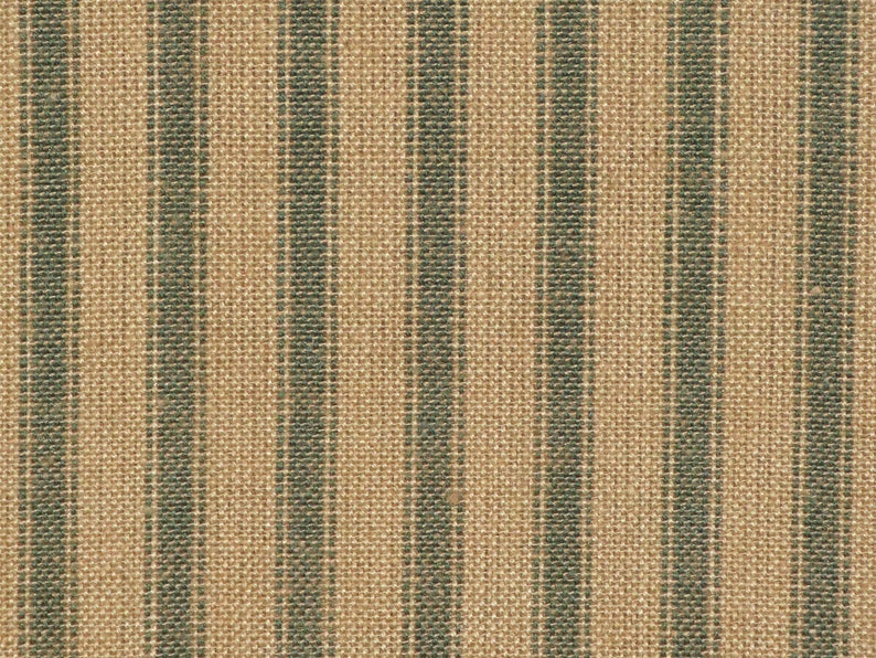 May include: A close-up of a woven fabric with alternating stripes of tan and dark green.
