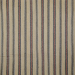 May include: A cream-coloured fabric featuring vertical stripes. Navy blue and red stripes alternate, running parallel. The fabric has a textured appearance, possibly woven, suitable for home decor or clothing.