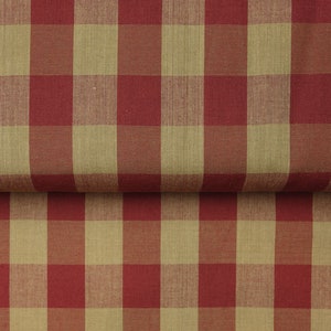 Pode incluir: Tecido xadrez vermelho e bege com textura tecida.