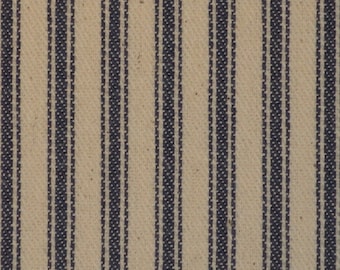 May include: A close-up of a fabric with a striped pattern. The fabric is white with thin, dark blue stripes.
