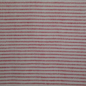 May include: Close-up of a fabric with a repeating pattern of thin, horizontal red stripes on a white background. The stripes have a textured, zig-zag appearance, creating a visually interesting design. The fabric appears to be a woven material, possibly cotton or linen.