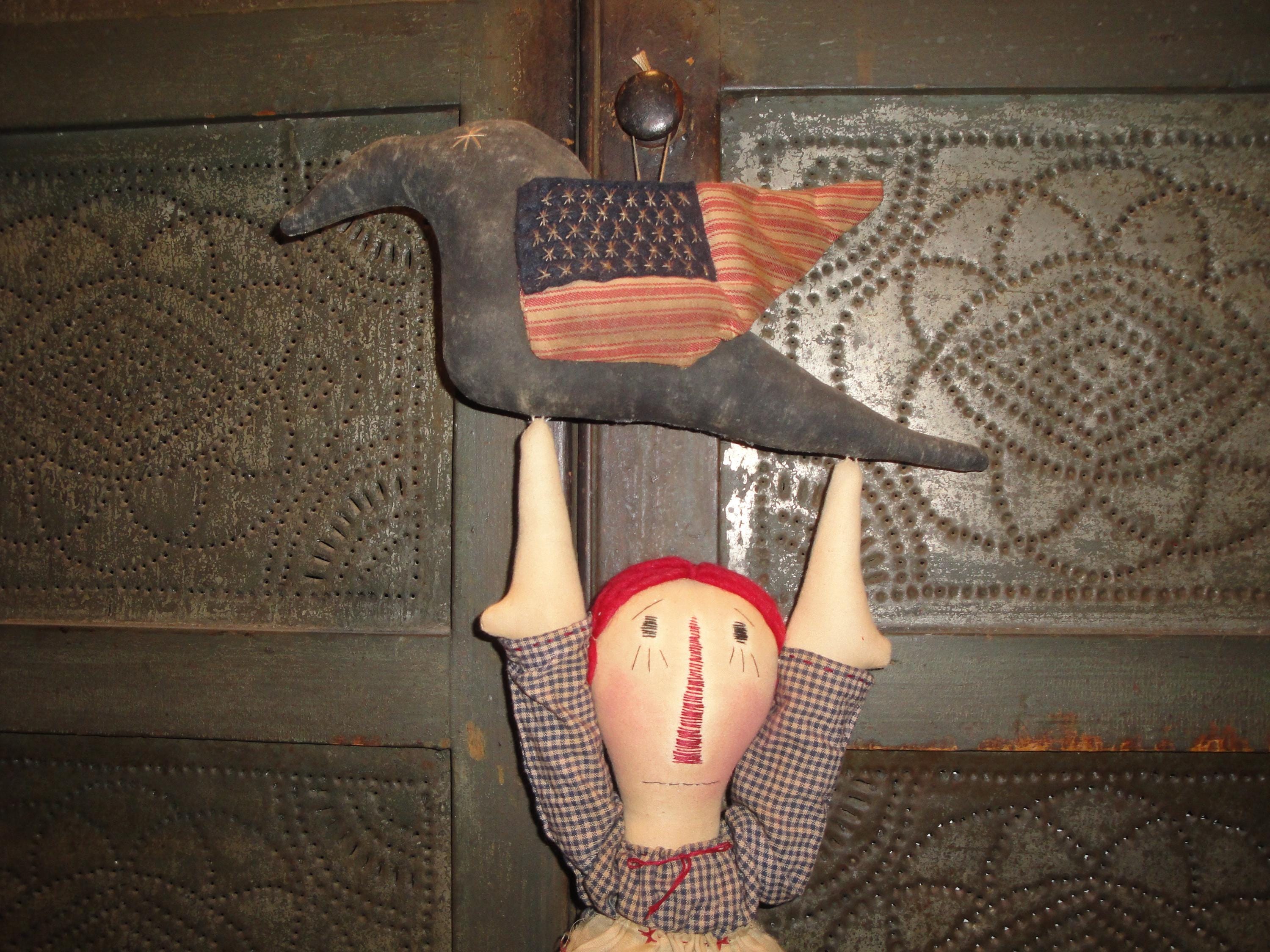 Primitive Hand Made Cloth Raggedy Ann Hanging From Painted Americana Crow With Ticking Wing