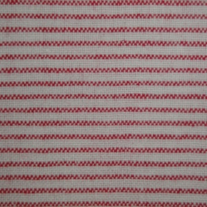May include: Close-up of a woven fabric with a repeating pattern of horizontal red stripes on a cream-colored background. The stripes have a textured, zig-zag appearance, creating a visually interesting textile.