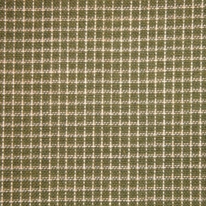 May include: Close-up of a green and white checkered fabric. The fabric has a woven texture with a grid pattern of white lines against a green background. The pattern is evenly spaced and creates a classic, simple design.