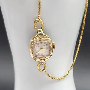Montre mécanique vintage à remontage Bulova avec 17 bijoux en plaqué or 10 carats