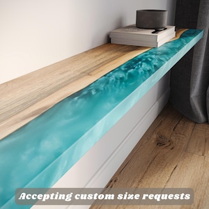 May include: A set of three ceramic mugs with a speckled, matte finish. The mugs are in shades of cream, light gray, and dark gray. Each mug has a simple, minimalist design, perfect for coffee or tea.