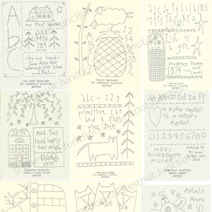 May include: A collection of 10 black and white embroidery patterns featuring various designs, including a pineapple, a cat, a house, a heart, a basket of pears, a basket of cats, an angel, and a tree. The patterns are titled with names like "My First Sampler", "Folky Sampler", "Primitive Cat and a Pine Tree", "A Pure Heart is a Happy Heart", "Happily Ever After", "Basket of Pears", "Basket of Cats", "Angels Among Us", and "Hoppy Angel".