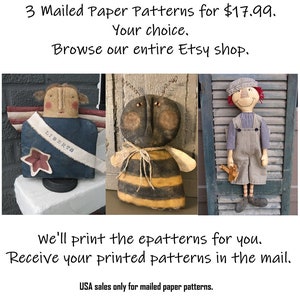 May include: Three handmade paper doll patterns are displayed. The dolls include an angel with a banner that says "LIBERTO", a bee with black and yellow stripes, and a boy in overalls. The text says "3 Mailed Paper Patterns" and "Receive your printed patterns in the mail."