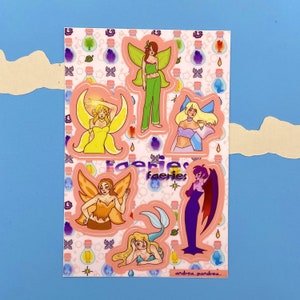 May include: A sheet of colorful stickers featuring fairies with wings and a variety of outfits. The stickers are on a pink background with a white border and the word "faeries" written in a whimsical font.