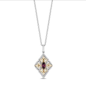 May include: A necklace featuring a diamond-shaped pendant suspended from a silver chain. The pendant showcases a central oval-cut dark red gemstone surrounded by yellow gold filigree accents and a border of small, clear pavé-set diamonds.