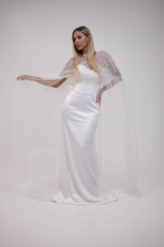 Elegant wedding dress with train and detachable beaded cape, Modern bridal outfit Elegant wedding dress with train and detachable beaded cape, Modern bridal outfit