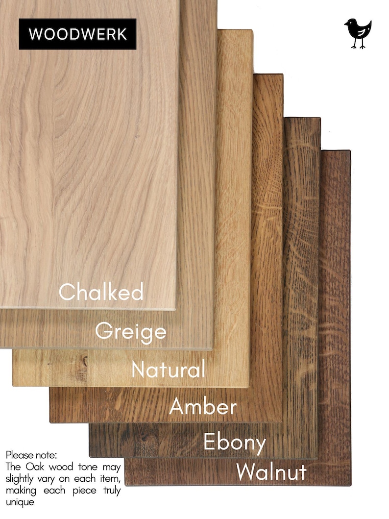May include: A collection of six rectangular oak wood samples arranged in a cascading stack. The finishes are labeled as Chalked, Greige, Natural, Amber, Ebony, and Walnut. The text WOODWERK appears in the top left corner with a bird icon.